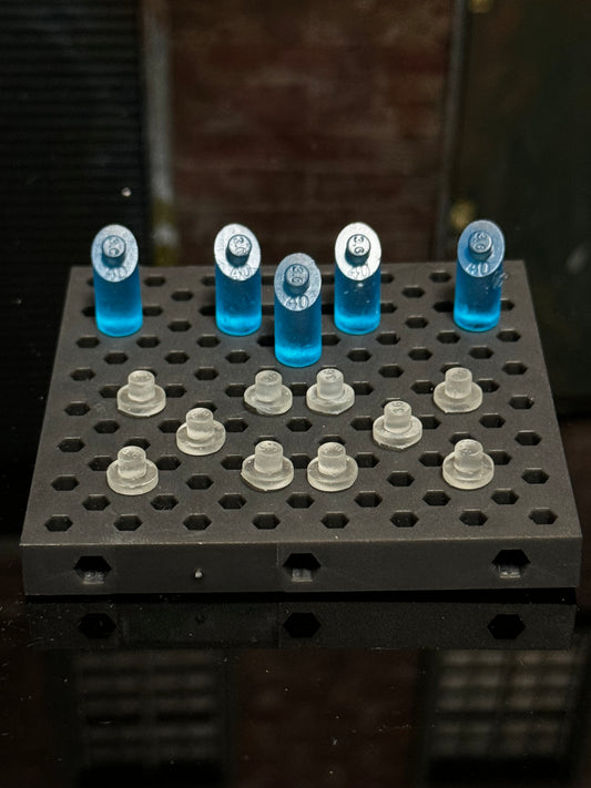 Figure stand pegs compatible with the Ultimate Weapons Rack